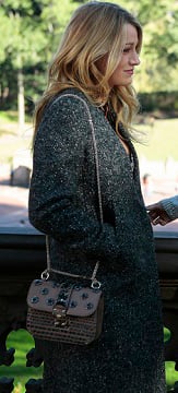 Serena's grey coat and brown purse on the Gossip Girl finale