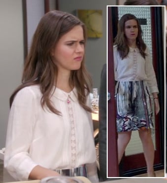 Betsey's white peter pan collar blouse and purple/blue stripe skirt on The Mindy Project