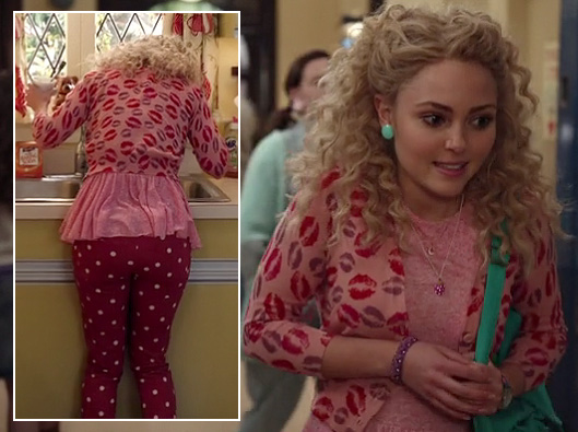 Carrie's pink polka dot jeans, lipstick kiss cardigan and turquoise earrings on The Carrie Diaries