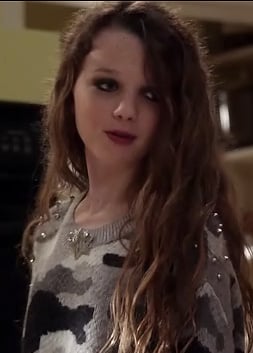 Dorrit's grey studded camo sweater on The Carrie Diaries