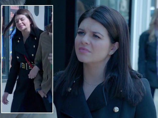 Penny's black trench coat with gold studded belt on Happy Endings