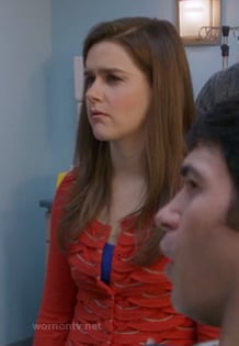 Betsey's orange scalloped cardigan on The Mindy Project