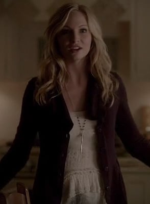 Caroline's white textured peplum top and purple cardigan on The Vampire Diaries