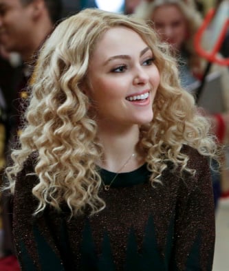 Carrie's green sweater with black glittery zig zag top on The Carrie Diaries