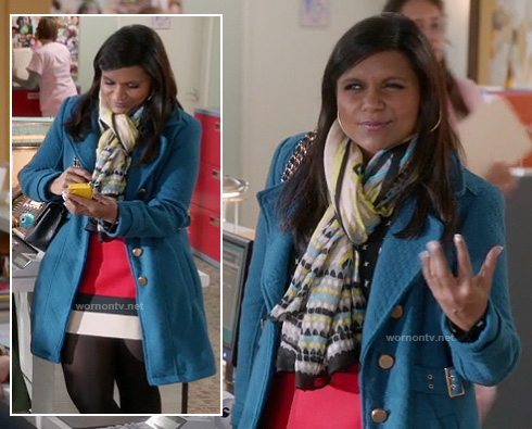 Mindy's blue coat with red/black/white colorblock skirt and green scarf on The Mindy Project