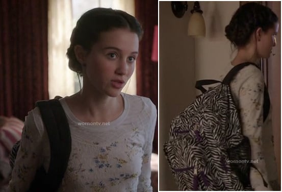 Sasha's zebra stripe backpack and white floral lace top on Bunheads