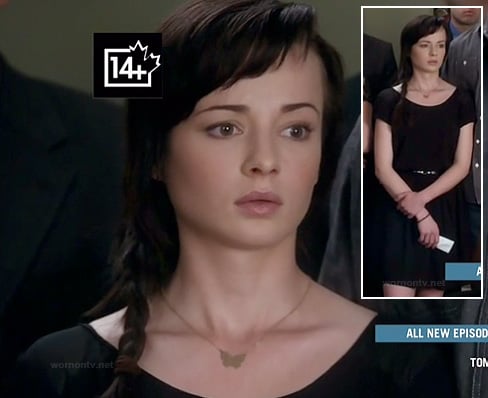 Jenna's black dress with mesh panels and button back on Awkward