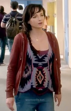 Jenna's purple geo print tank top and rust colored hoodie on Awkward