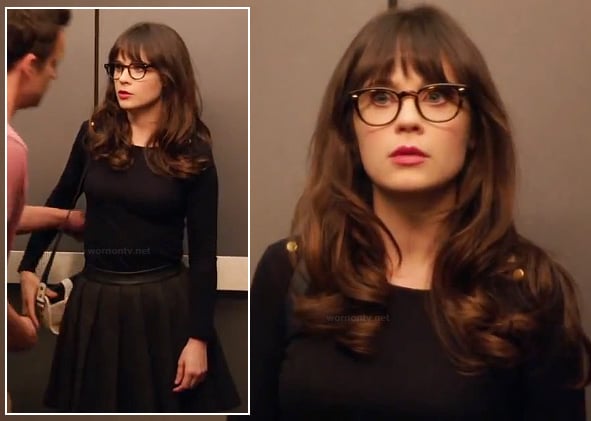 Jess's black long sleeve top with gold shoulder buttons and black pleated skirt on New Girl