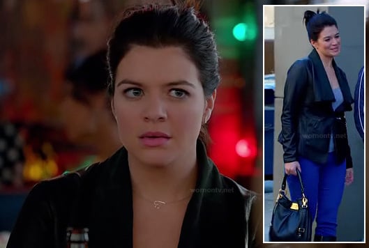 Penny's black leather jacket and back with sideways heart necklace on Happy Endings
