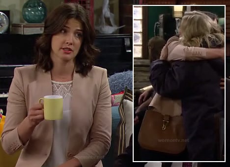 Robin's beige blazer, white lace top and tan purse on How I Met Your Mother