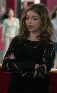 Haley's black loose knit sweater on Modern Family