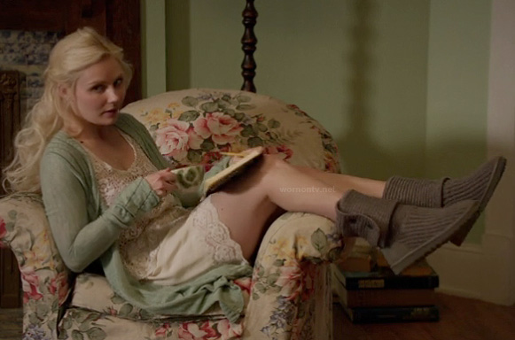 Scarlett's white crochet slip dress and ribbed slipper boots on Nashville