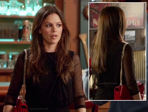 Zoe's sheer black dress with red bow purse on Hart of Dixie
