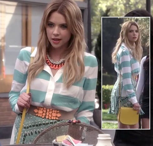 Hanna's green striped shirt, neon orange necklace, printed skirt and yellow purse on Pretty Little Liars