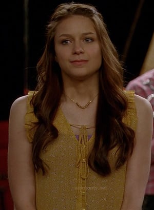 Marley's yellow ruffled tie front top on Glee