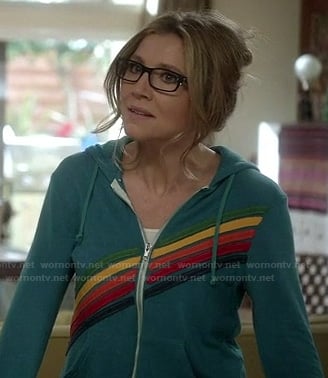 Polly's blue hoodie with rainbow diagonal stripes on How To Live With Your Parents