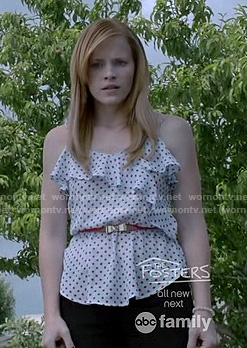 Daphne's white and red polka dot ruffled cami top and gold bow belt on Switched at Birth