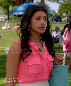 Divya's hot pink sleeveless shirt on Royal Pains