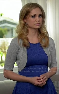 Jenna's blue floral drop waist dress and grey shrug on Wilfred