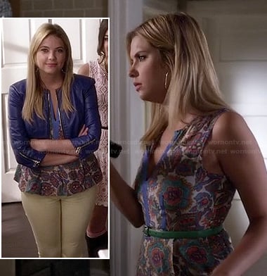 Hanna's floral split neck peplum top and blue cropped leather jacket on Pretty Little Liars