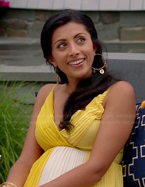 Divya's yellow and white pleated dress on Royal Pains