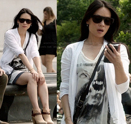 Joan's wolf graphic tee and ankle boots on Elementary