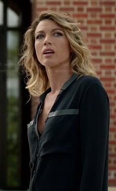 Maxine's black shirt with grey contrast trim and pockets on Under the Dome