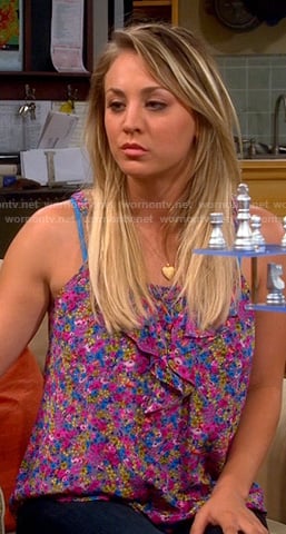 Penny's pink and purple floral ruffle front top on The Big Bang Theory