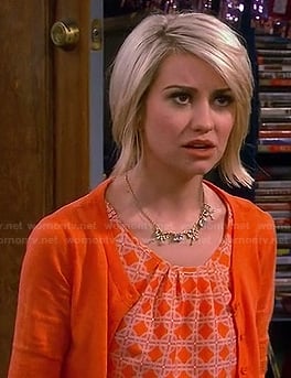 Riley's orange geometric print top on Baby Daddy