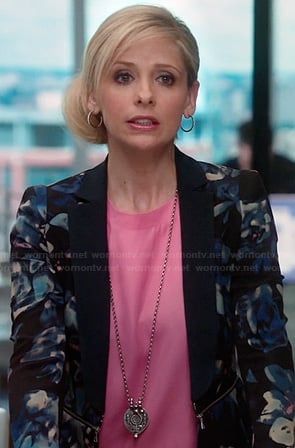 Sydney's blue floral blazer and pink blouse on The Crazy Ones