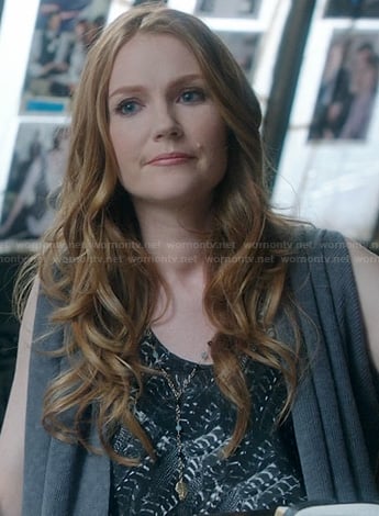 Abby's feather printed top and sleeveless cardigan on Scandal