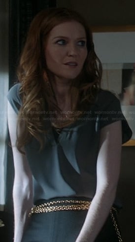 Abby's grey split neck blouse on Scandal