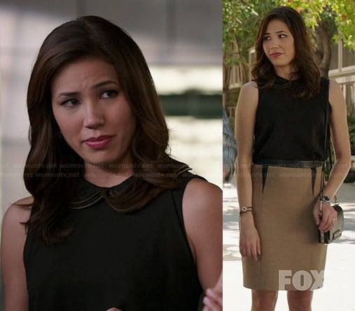 Angela's beige skirt with leather triangle insets and black collared blouse on Bones