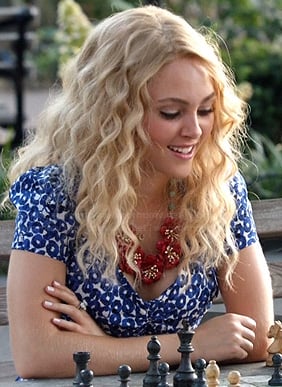 Carrie's blue and white floral print dress (romper) playing chess on The Carrie Diaries