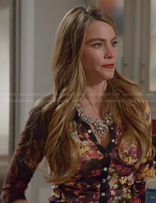 Gloria's black floral print cardigan on Modern Family