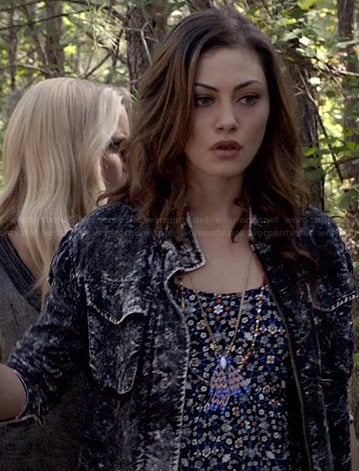 Hayley's floral top and black acid wash denim jacket on The Originals