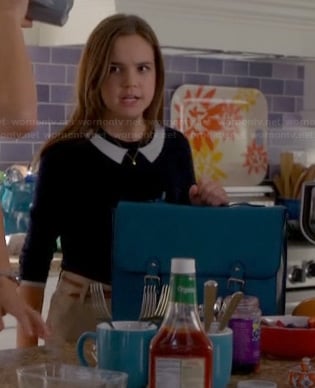 Hillary's sweater with faux collar and blue satchel on Trophy Wife