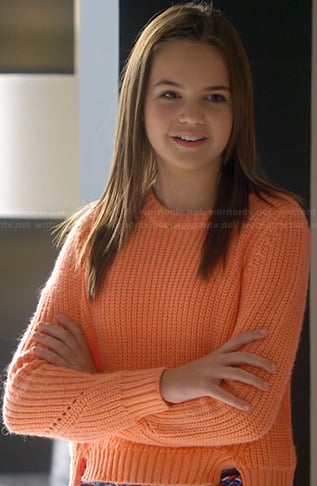 Hillary's orange knit sweater on Trophy Wife