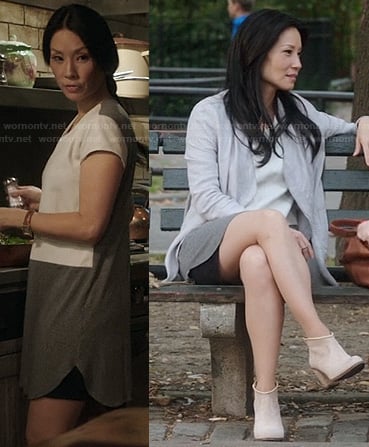 Joan's white leather and grey two-tone dress on Elementary