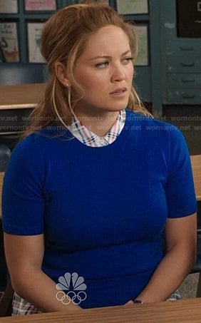 Julia's white plaid sleeveless shirt and blue short sleeve sweater on Parenthood