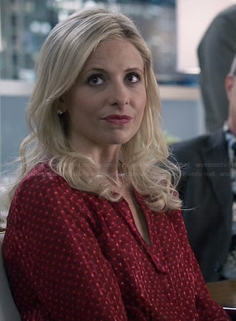 Sydney's red dot printed blouse on The Crazy Ones