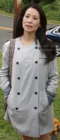 Joan's beige double breasted collarless coat on Elementary