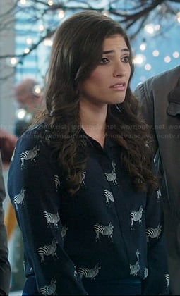 Lauren's zebra print top on The Crazy Ones