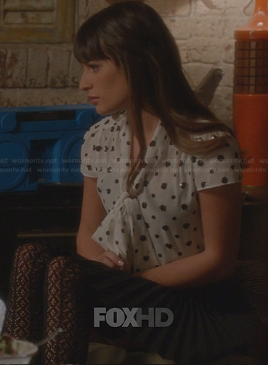 Rachel's white blouse with black sequin spots and pleated skirt on Glee