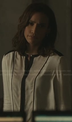 Tess's white blouse with black contrast trim on Beauty and the Beast