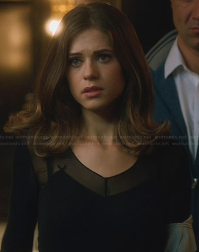 Alex's black mesh top with cross detail on Nikita