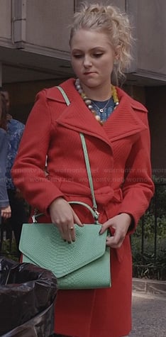 Carrie's red coat and mint green purse on The Carrie Diaries