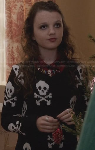 Dorrit's black skull sweater on The Carrie Diaries