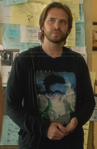 Seymour's black and blue graphic Diesel shirt on Nikita
